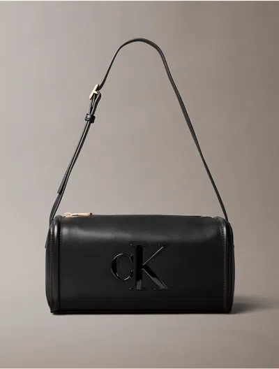 Calvin Klein Logo-plaque Barrel Shoulder Bag In Black