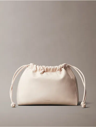 Calvin Klein Women's Drawstring Crossbody Bag In Hushed Pink