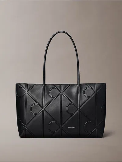 Calvin Klein Women's Embossed Allover Monogram Logo Tote Bag In Black