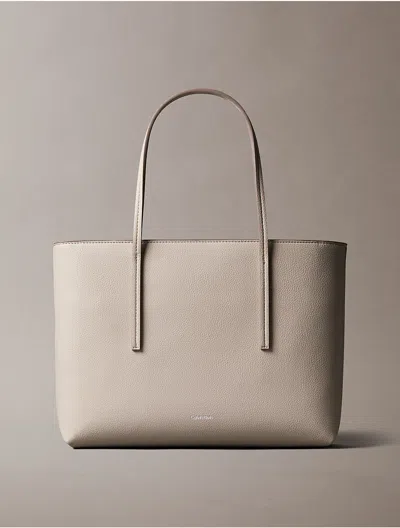 Calvin Klein Women's Embossed Logo Small Tote Bag In Gray