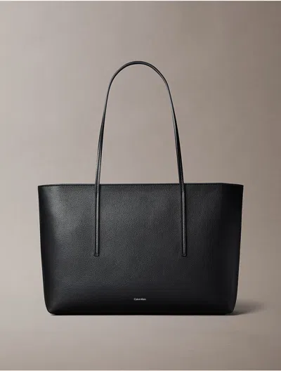 Calvin Klein Women's Embossed Logo Zip Tote Bag In Blue