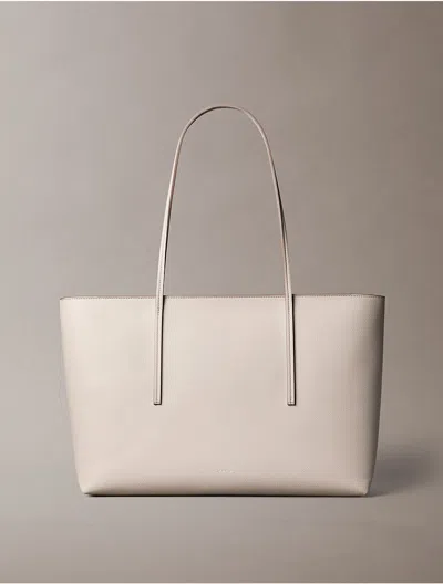 Calvin Klein Women's Embossed Logo Zip Tote Bag In Red