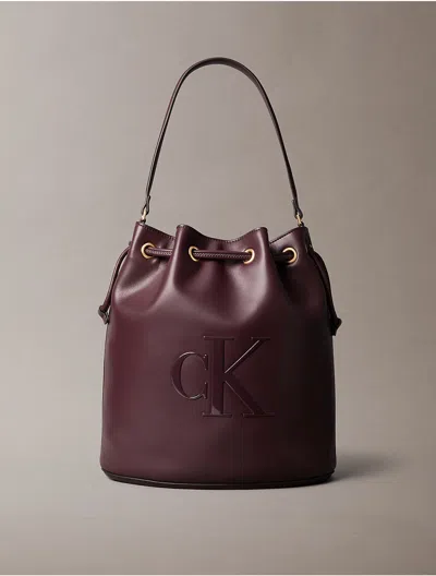 Calvin Klein Women's Embossed Monogram Logo Bucket Bag In Brown