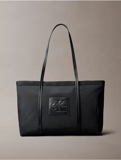 Calvin Klein Women's Embossed Monologo Tote Bag In Black