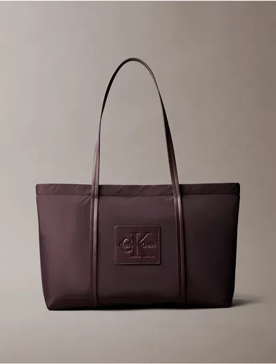 Calvin Klein Women's Embossed Monologo Tote Bag In Fudge