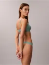 Calvin Klein Women's Invisibles Thong In Green