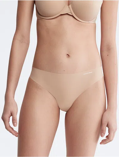 Calvin Klein Women's Invisibles Thong In Desert
