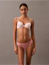 Calvin Klein Women's Invisibles Thong In Luminous Peach
