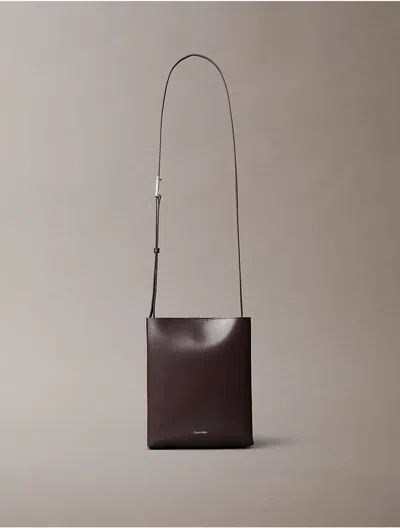 Calvin Klein Women's Line Leather Crossbody Bag In Raisin
