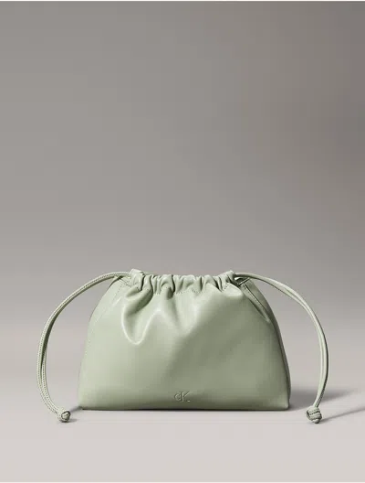 Calvin Klein Women's Monogram Logo Drawstring Crossbody Bag In Slate