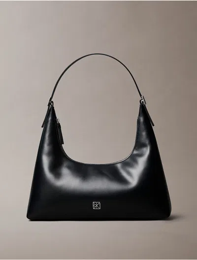 Calvin Klein Women's Monogram Logo Emblem Leather Shoulder Bag In Black