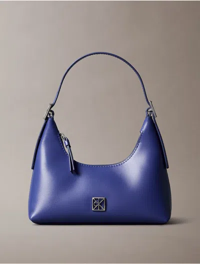 Calvin Klein Women's Monogram Logo Emblem Leather Small Shoulder Bag