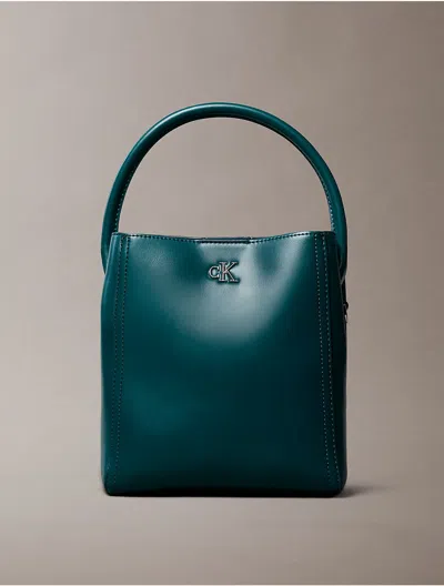 Calvin Klein Women's Monogram Logo Hardware Bucket Bag In Blue