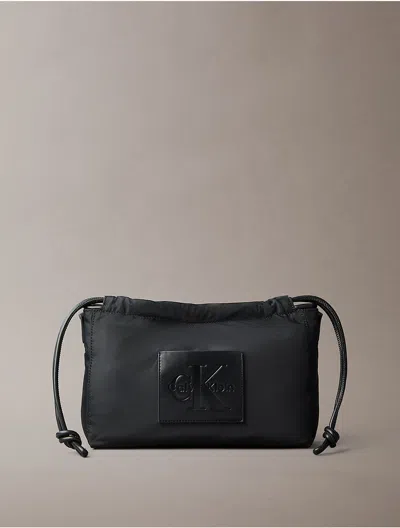 Calvin Klein Women's Nylon Drawstring Monologo Crossbody Bag In Black