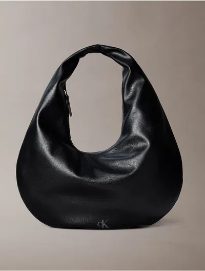 Calvin Klein Women's Pebble Grain Crescent Shoulder Bag In Black