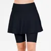 CALYPSA WOMEN'S FLARED MID-THIGH SWIM SKIRT WITH BIKE SHORTS