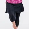 Calypsa Women's Plus High Waisted Flared Swim Skort With Attched Capri Leggings In Black
