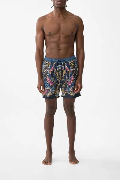 Camilla Mid Length Boardshort With Elastic Waist Ornate On A Plate In Blue