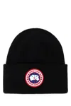 Canada Goose Ribbed Black Merino Wool Toque With Contrast Emblem In Blue