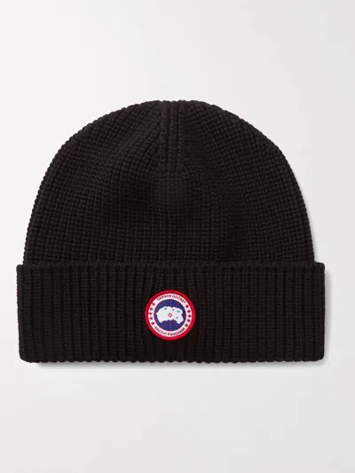 Canada Goose Logo-patch Ribbed-knit Beanie Hat In Black
