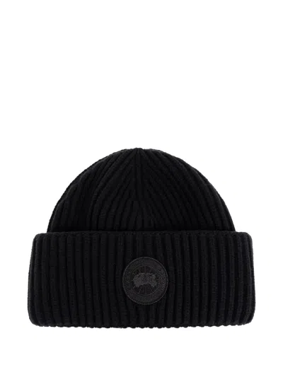 Canada Goose Logo-patch Ribbed-knit Beanie Hat In Black