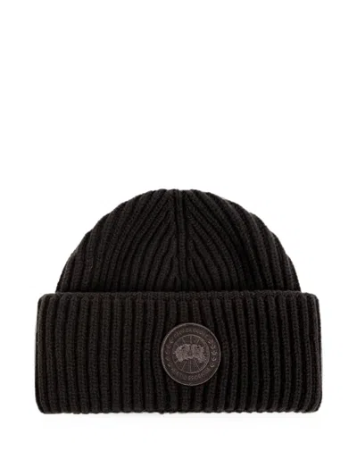 Canada Goose Logo-patch Ribbed-knit Beanie Hat In Black