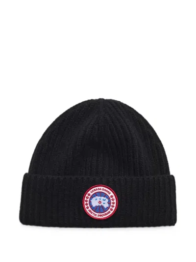 Canada Goose Logo-patch Ribbed-knit Beanie Hat In Black