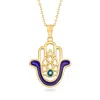 CANARIA FINE JEWELRY CANARIA 10KT YELLOW GOLD HAMSA HAND PENDANT NECKLACE WITH BLUE ENAMEL