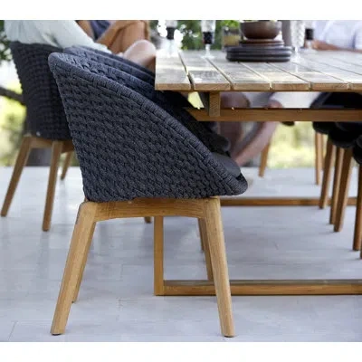 Cane-line Peacock Wicker Premium All-weather Wicker Outdoor Dining Armchair With Sunbrella® Cushion In Blue