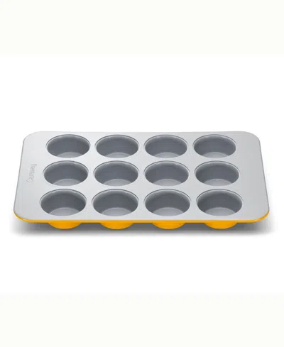 Caraway Non-stick Ceramic Muffin Tin In Marigold