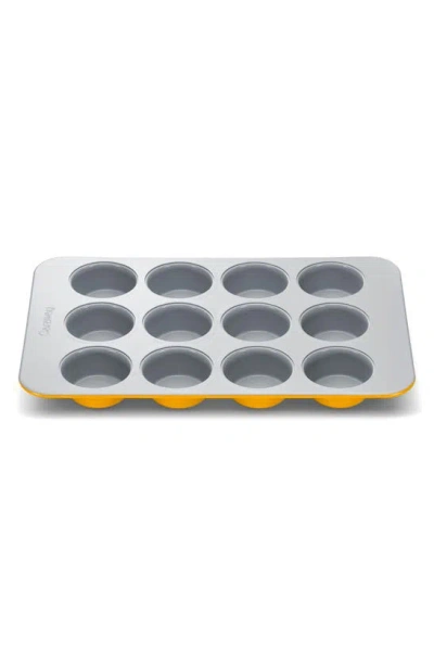 Caraway Nonstick Muffin Pan In Marigold