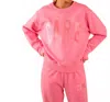 Care Tucker 90's Baggy Care Crewneck Sweatshirt In Pink In Pink