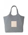 Care Tucker Maxi Quilted Denim Tote Bag In Blue In Blue