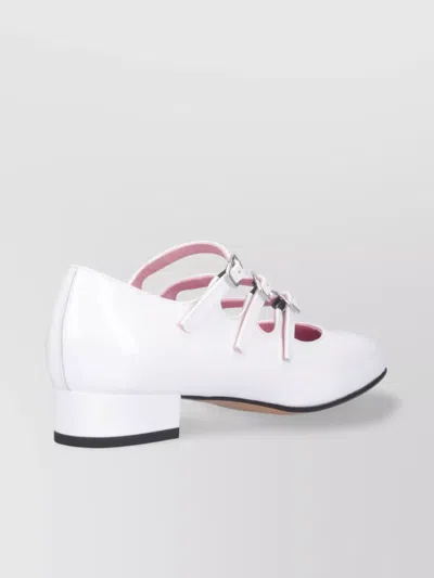CAREL BLOCK HEEL TRIPLE STRAP PUMPS