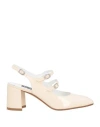 Carel Paris Banana Patent Leather Slingback Pumps In Beige