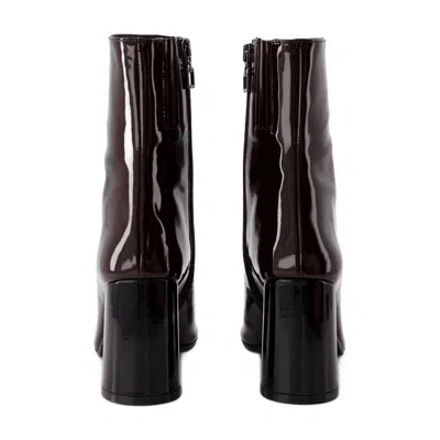 Carel Patent Leather Ankle Boot In Brown