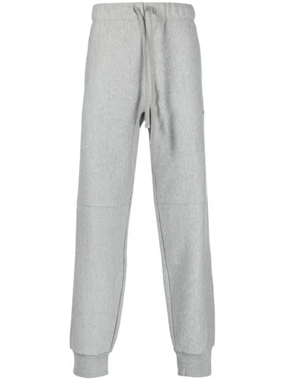 Carhartt Embroidered-logo Cotton Trackpants In Grey