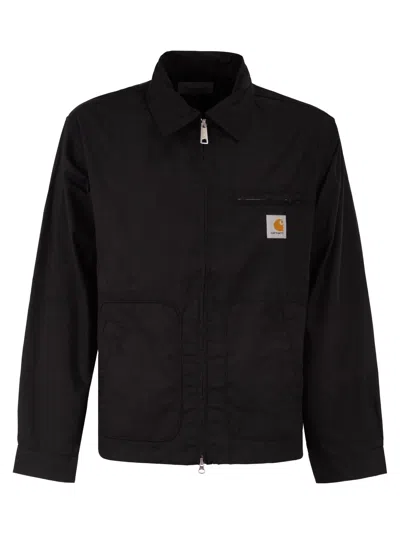 Carhartt Jacket With A Logo On The Chest In Black