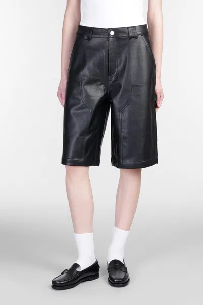 CARHARTT NORWICH DK SHORT SHORTS IN BLACK FAUX LEATHER