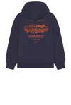 Carhartt Hooded Sweatshirt With Graphic Print And Pockets In Stone Washed Blue & Vermillion