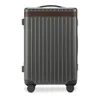 Carl Friedrik The Carry On Spinner Suitcase In Grey/chocolate