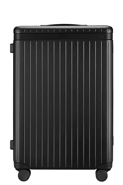 Carl Friedrik The Check-in Suitcase In Black