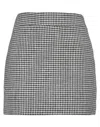 Carla G. Mini Skirts In Black