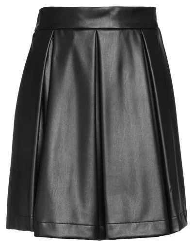 Carla G. Mini Skirts In Black