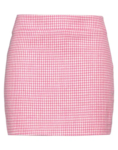 Carla G. Mini Skirts In Magenta