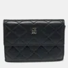 Carolina Herrera Black Quilted Leather Flap Compact Wallet In Brown
