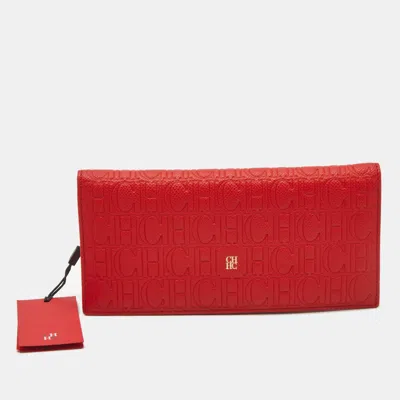 Pre-owned Carolina Herrera Red Monogram Embossed Leather Bifold Long Wallet