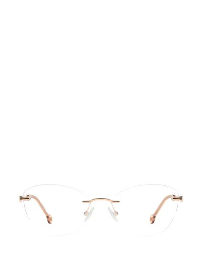 Carolina Herrera Rimless Cat-eye Glasses In Pink