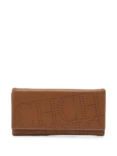 Pre-owned Carolina Herrera Vintage Perforated-logo Clutch Bag In Brown