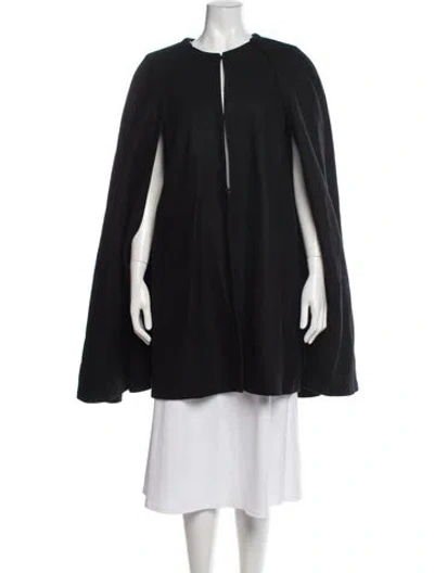 Pre-owned Carolina Herrera Virgin Wool Cape In Black